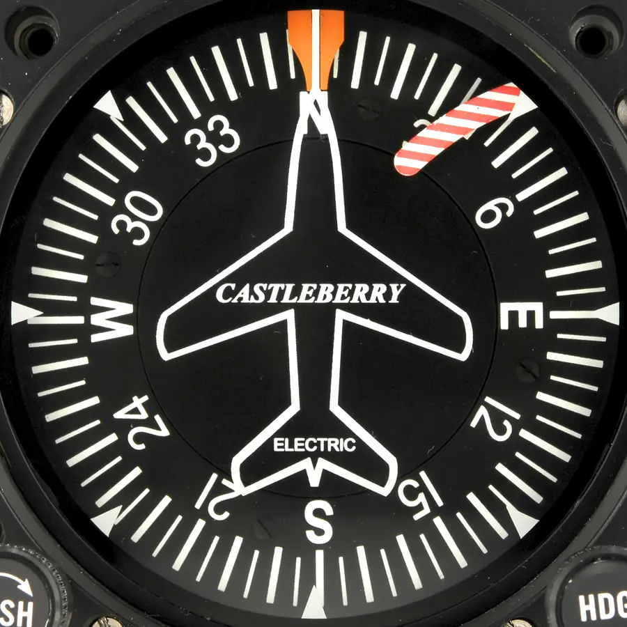 Castleberry electric directional gyro: compass card, airplane symbol and heading bug