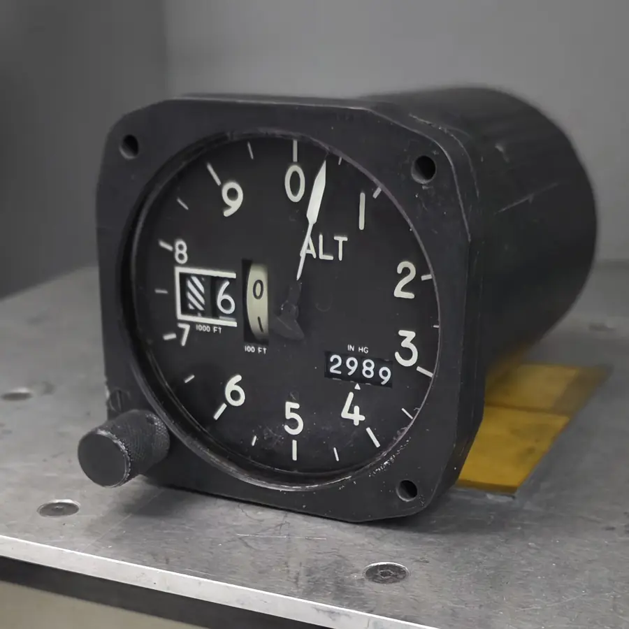 Aircraft altimeter with a barometric setting window on the shop bench