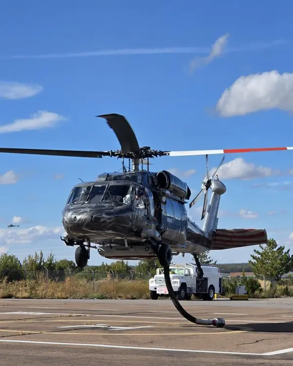 Castleberry UH-60 Black Hawk lifting off from the ramp, main rotor blades turning