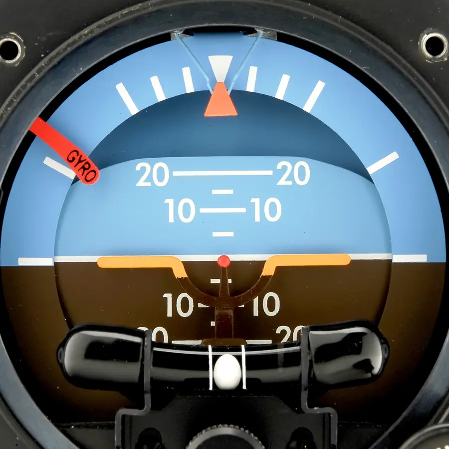 Attitude indicator dial with a gyro warning flag